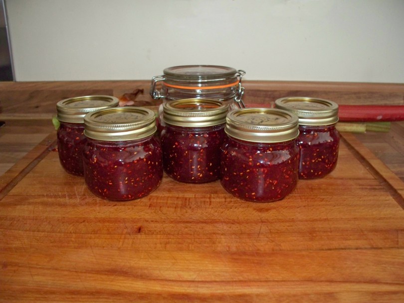 Picture of six jars of raspberry jam