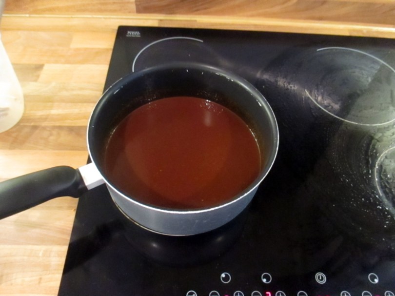 Picture of a saucepan of hot chilli sauce