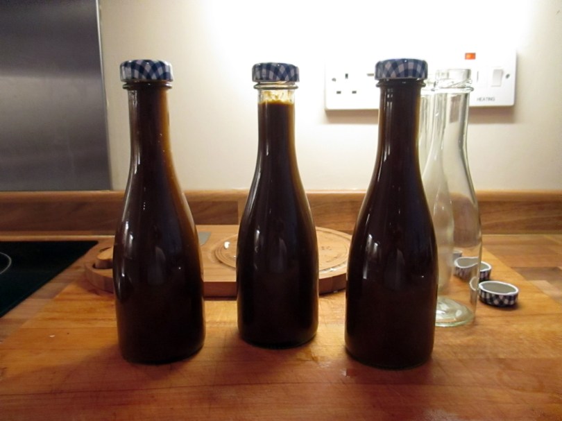 Picture of three bottles of hot chilli sauce