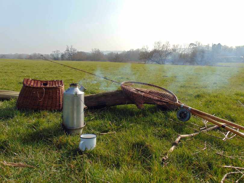 Picture of a Kelly Kellte boiling along with vintage fishing gear