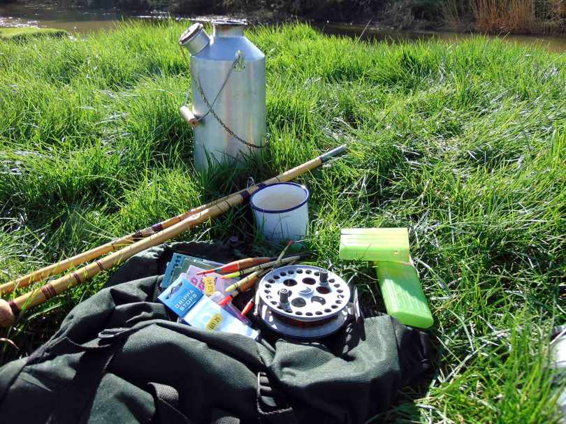 Picture of fishing equipment. Rod, reel, floats and my Kelly Kettle.